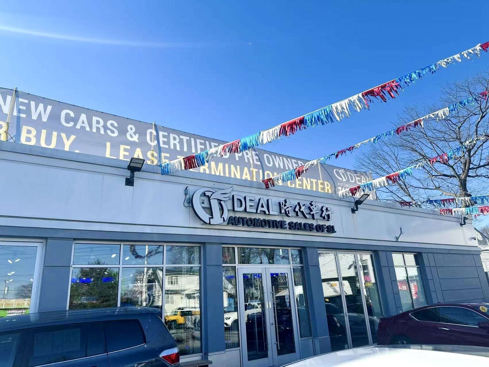 Ideal Auto Sales Staten Island dealership building under clear sky