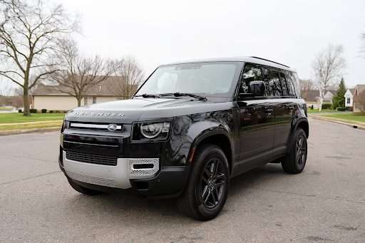Black SUV on suburban street, ideal for Staten Island car dealerships