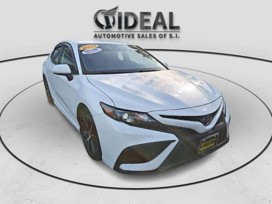 White car at Ideal Auto Sales Staten Island, a leading Staten Island car dealership.