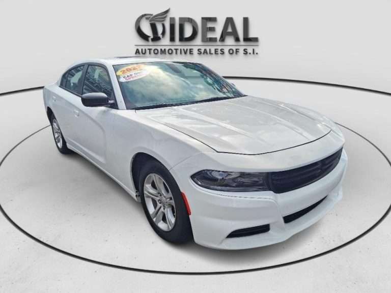 White car at Ideal Auto Sales Staten Island, a leading car dealership.