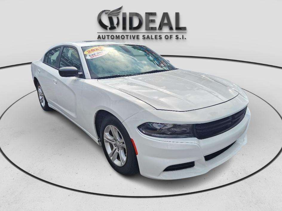 White car at Ideal Auto Sales Staten Island, a leading car dealership.
