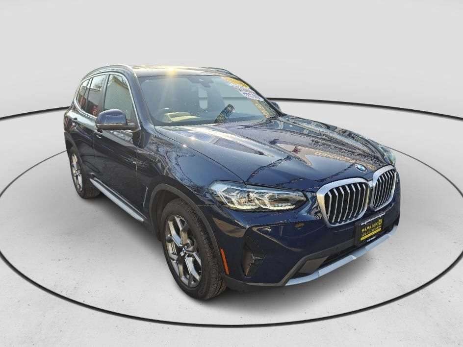 Sleek blue SUV at Staten Island car dealerships, Ideal Auto Sales Staten Island, showcasing top used cars.